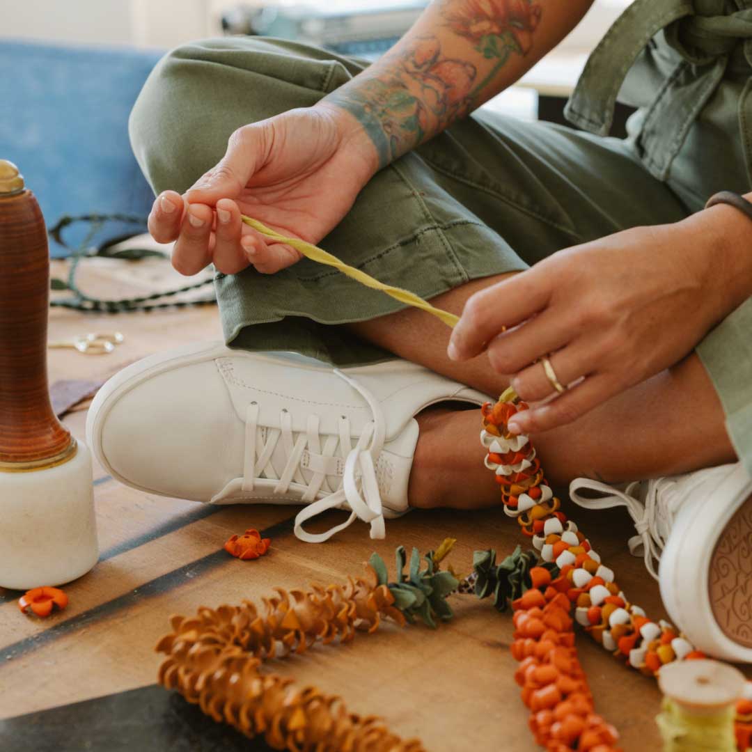 OluKai Smart Buy | Pehuea Lī ‘Ili Women's Leather Sneakers - White