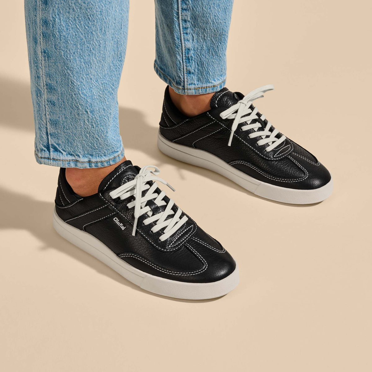 OluKai Smart Buy | Hā‘upu Women’s Leather Sneakers - Onyx