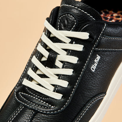 OluKai Smart Buy | Hā‘upu Women’s Leather Sneakers - Onyx