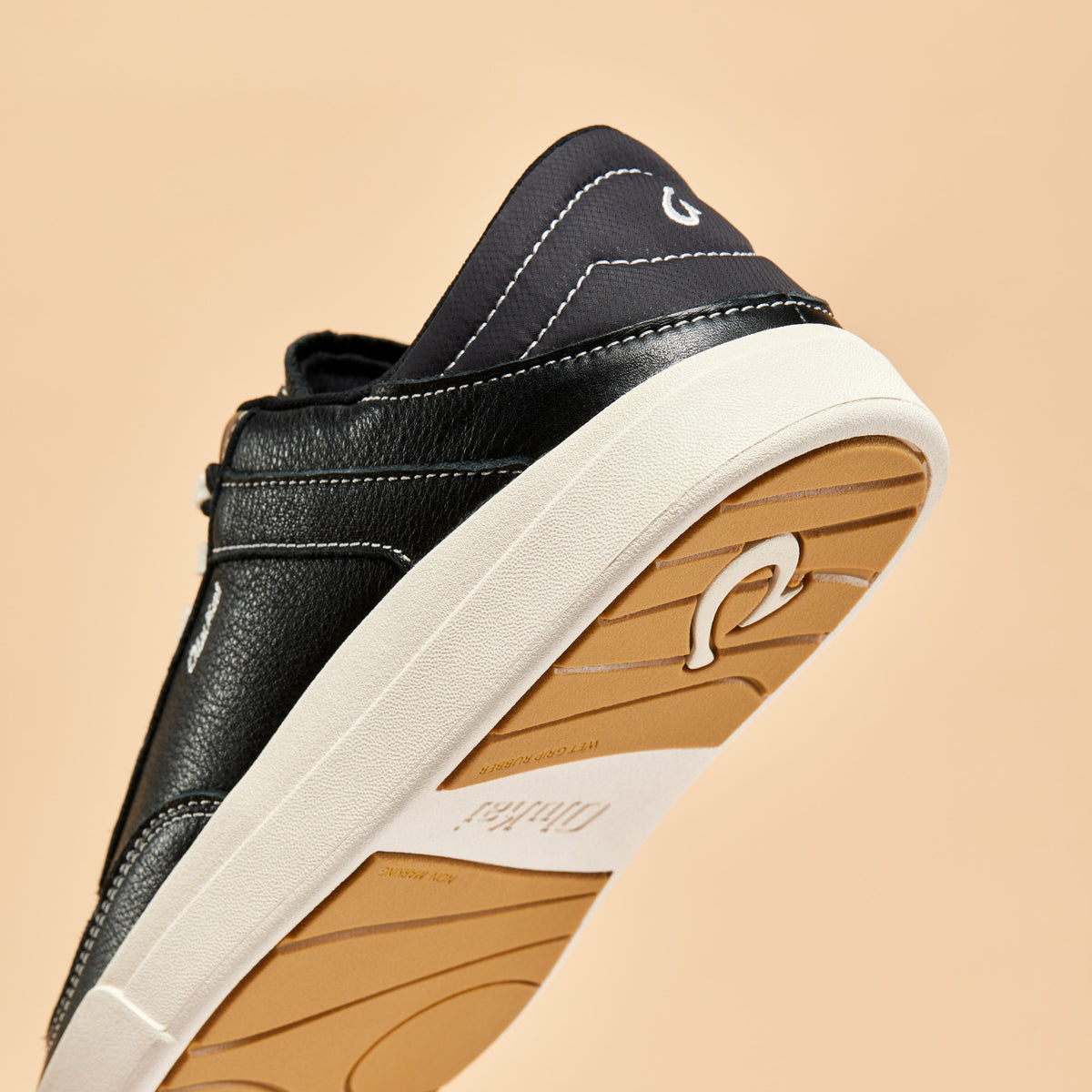 OluKai Smart Buy | Hā‘upu Women’s Leather Sneakers - Onyx